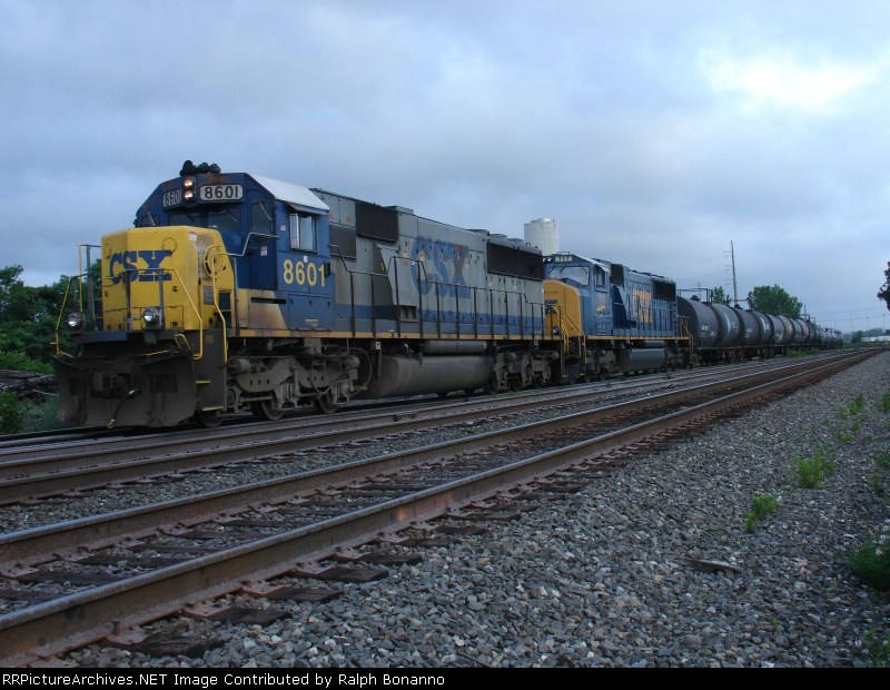 Q 273 waits to head north at the home signal at CP-5 under darkening skies